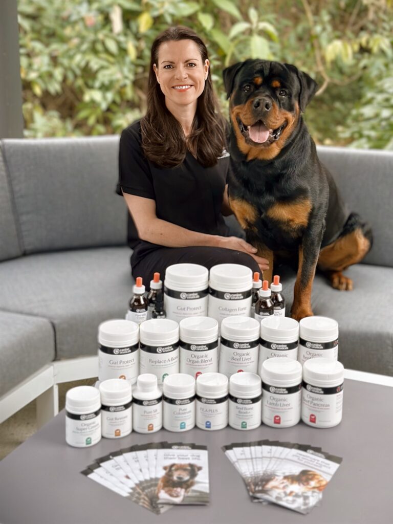Narelle Cooke with her Rottweiler Mando and the Canine Ceuticals supplement range